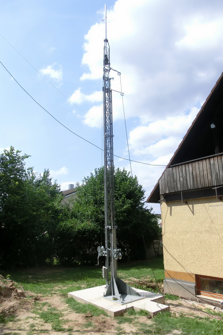 rotor, mast bearing and antenna mast mounted and the first 2 of 4 counter weights